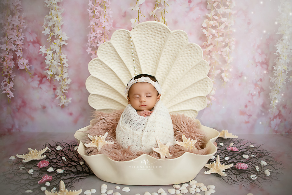Newborn Photoshoot - 50 Days Baby Girl Photoshoot with Pearl Shell, Potato sac, Swing with Flower Theme