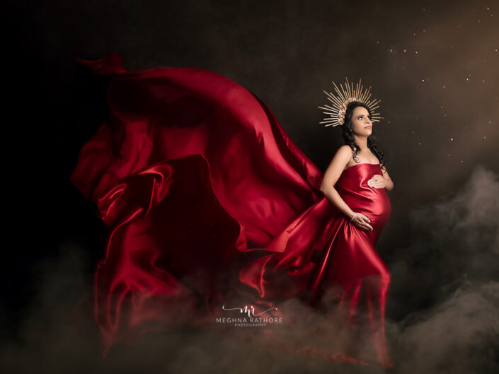 Maternity Album - Maternity Photoshoot in Premium Gowns and Red Drape By Meghna Rathore Photography