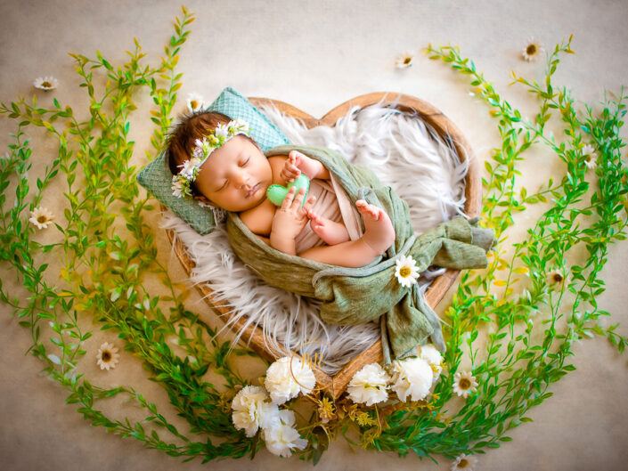 Newborn Gallery - 40 Days Baby Girl Photoshoot Using Rust, Green and Purple Florals.