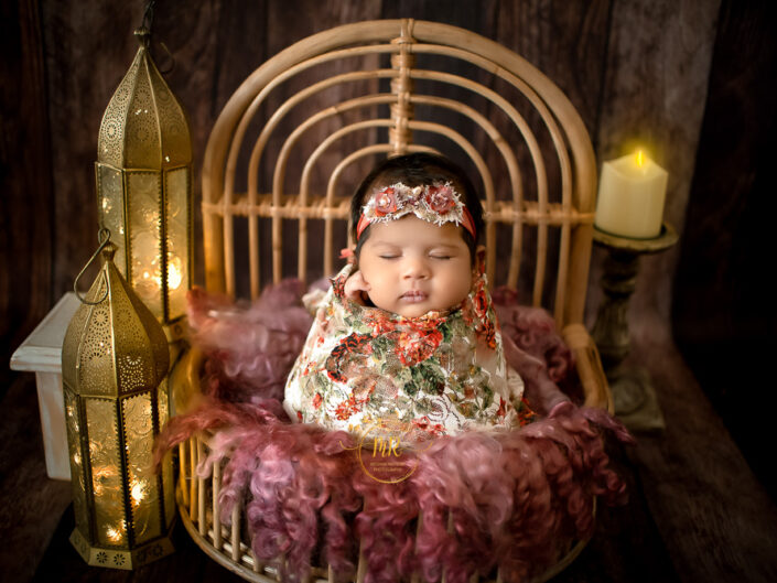 Newborn Gallery -  40 Days Girl Newborn Photoshoot With Blue, Greens, Reds, Pink Floral and Props Setups
