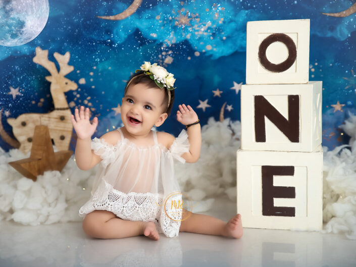 Kids Gallery - 1 Year Baby Girl Pre Birthday Photoshoot In Fashion, Sunflower And Pink Celebration Themes.