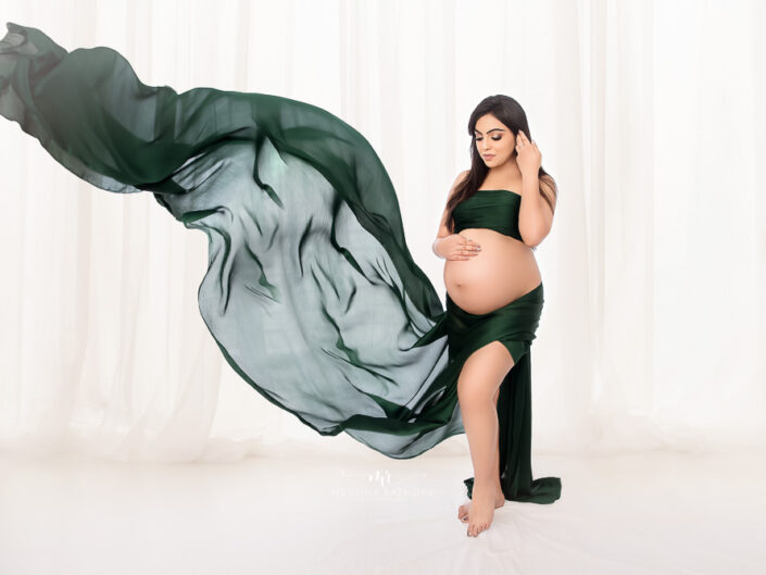 Maternity Gallery - Gorgeous Mommy to Be  Maternity Photoshoot in Purpe Gown and Green Drape.