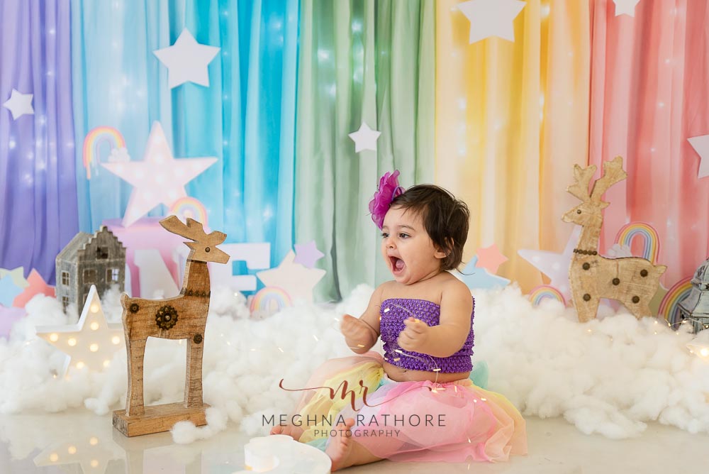 1 year old girl kid professional photoshoot laughing candid posing at meghna rathore photography in delhi gurgaon