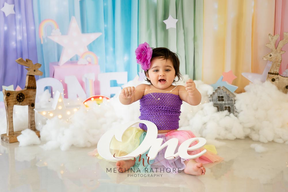 1 year old girl kid professional photoshoot laughing candid posing at meghna rathore photography in delhi gurgaon