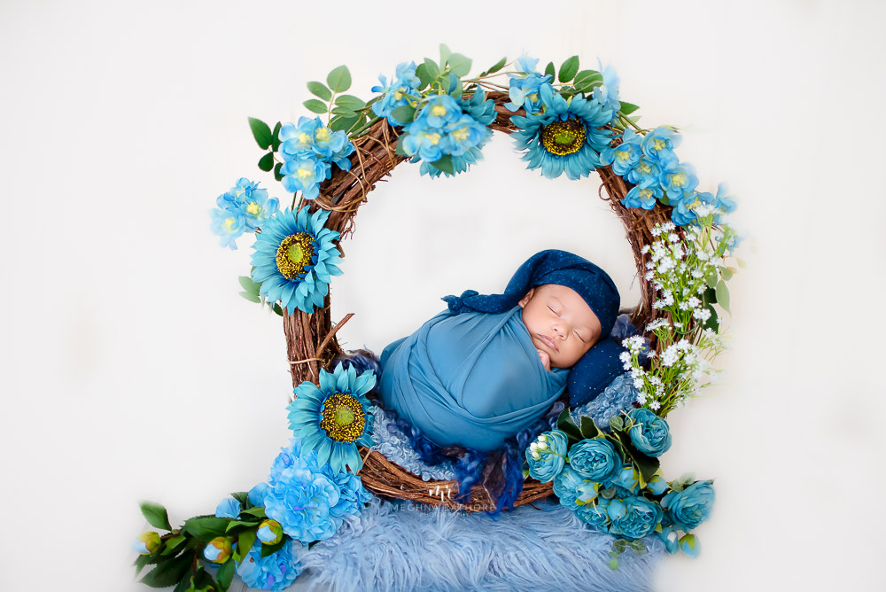 27 days old newborn baby boy photoshoot album with various themes and setup by meghna rathore