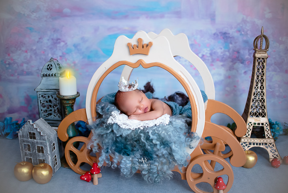 1 month old newborn baby girl photoshoot album props carriage themes by meghna rathore