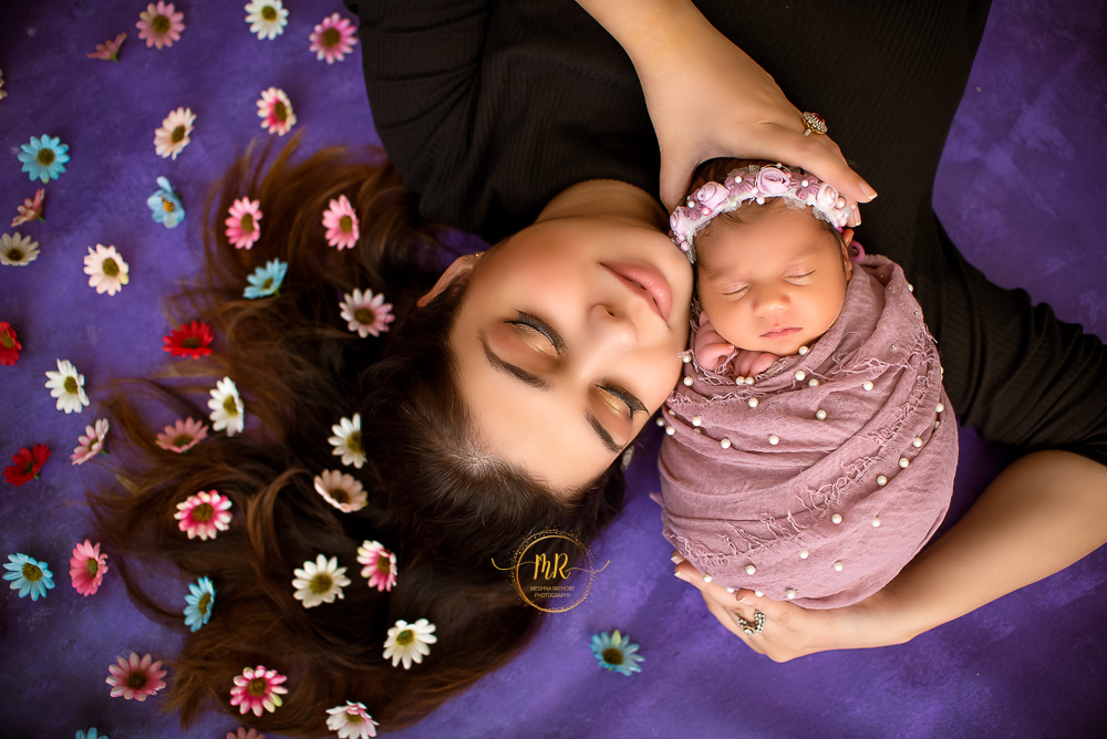 Newborn Gallery – 20 Days Baby Girl Photoshoot In Dreamcatcher and Various Red, Purple, whites Florals and Family Photoshoot