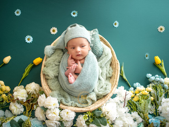Newborn Album – 21 Days Boy Baby Photoshoot Using Potato sac posing, Different Props Combinations in Various Colors Like Blue, Boho, Red along with Family Shoot