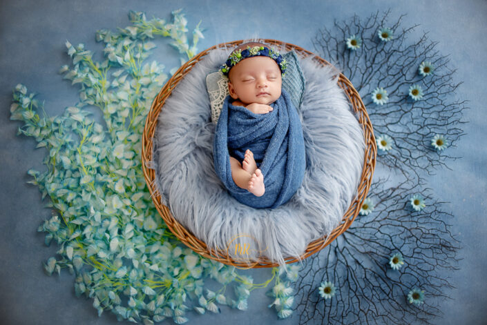 This image captures the serene beauty of a baby nature-inspired surroundings, evoking a sense of peace and natural harmony captured by Meghna Delhi NCR best maternity and child photograpger.