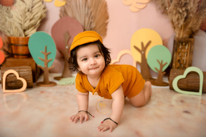 baby crawling image with boho theme decoration photoshoot by meghna from delhi