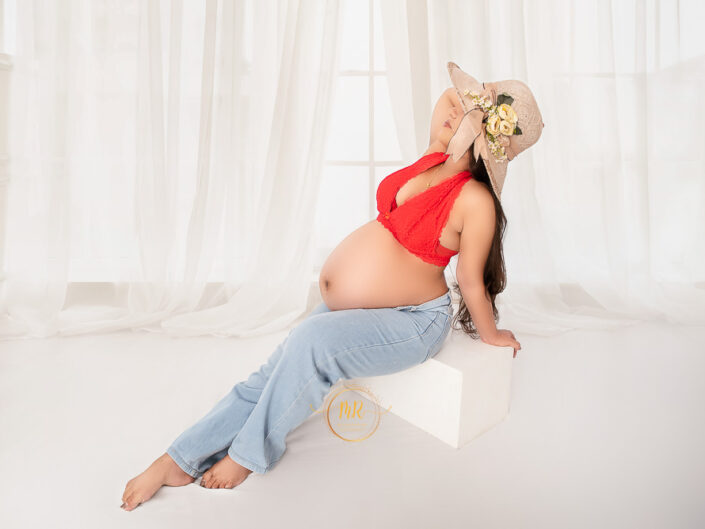 Maternity Gallery - Gorgeous mommy to be in beige skirt pink gown and Bralette